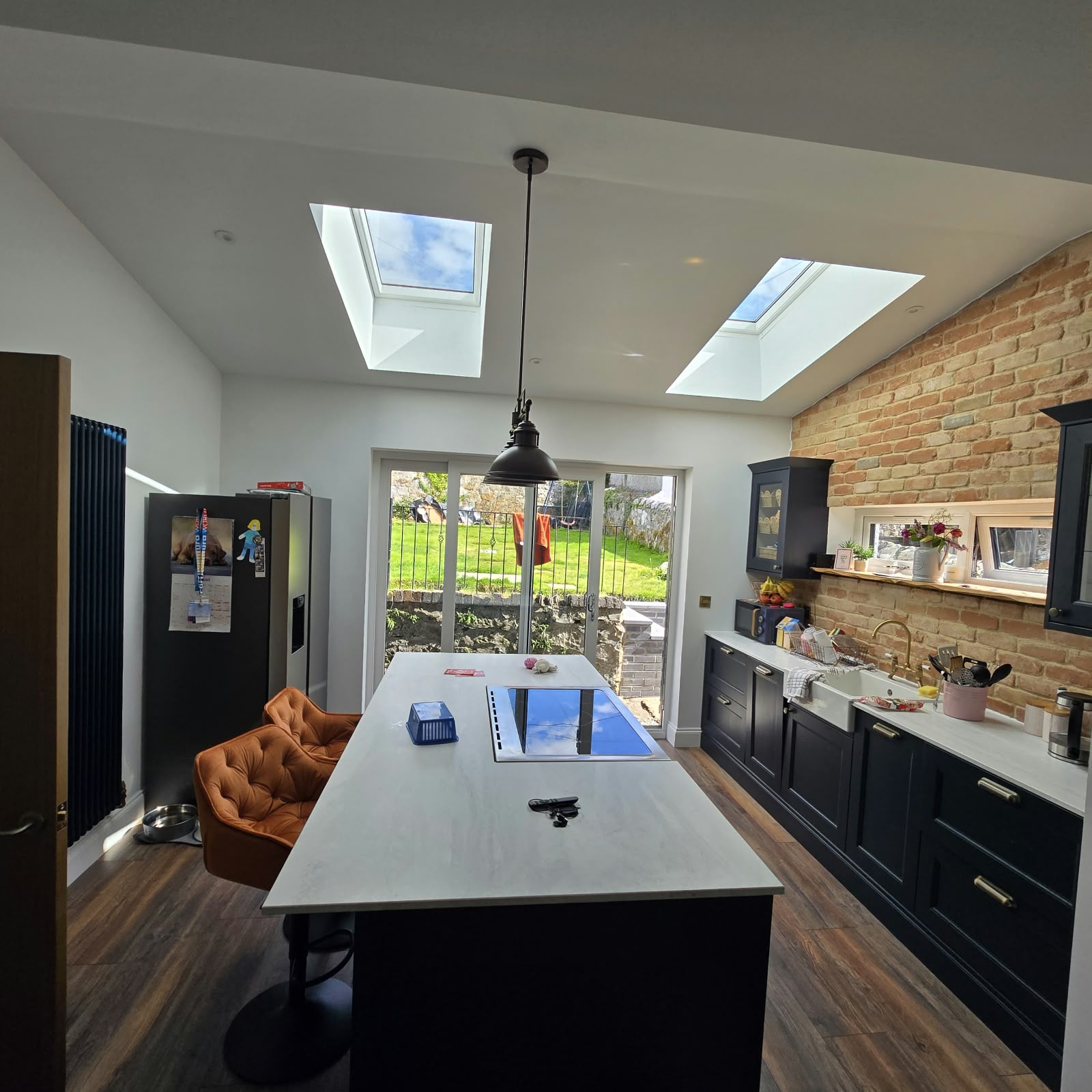 Kitchen with three skylights and an island