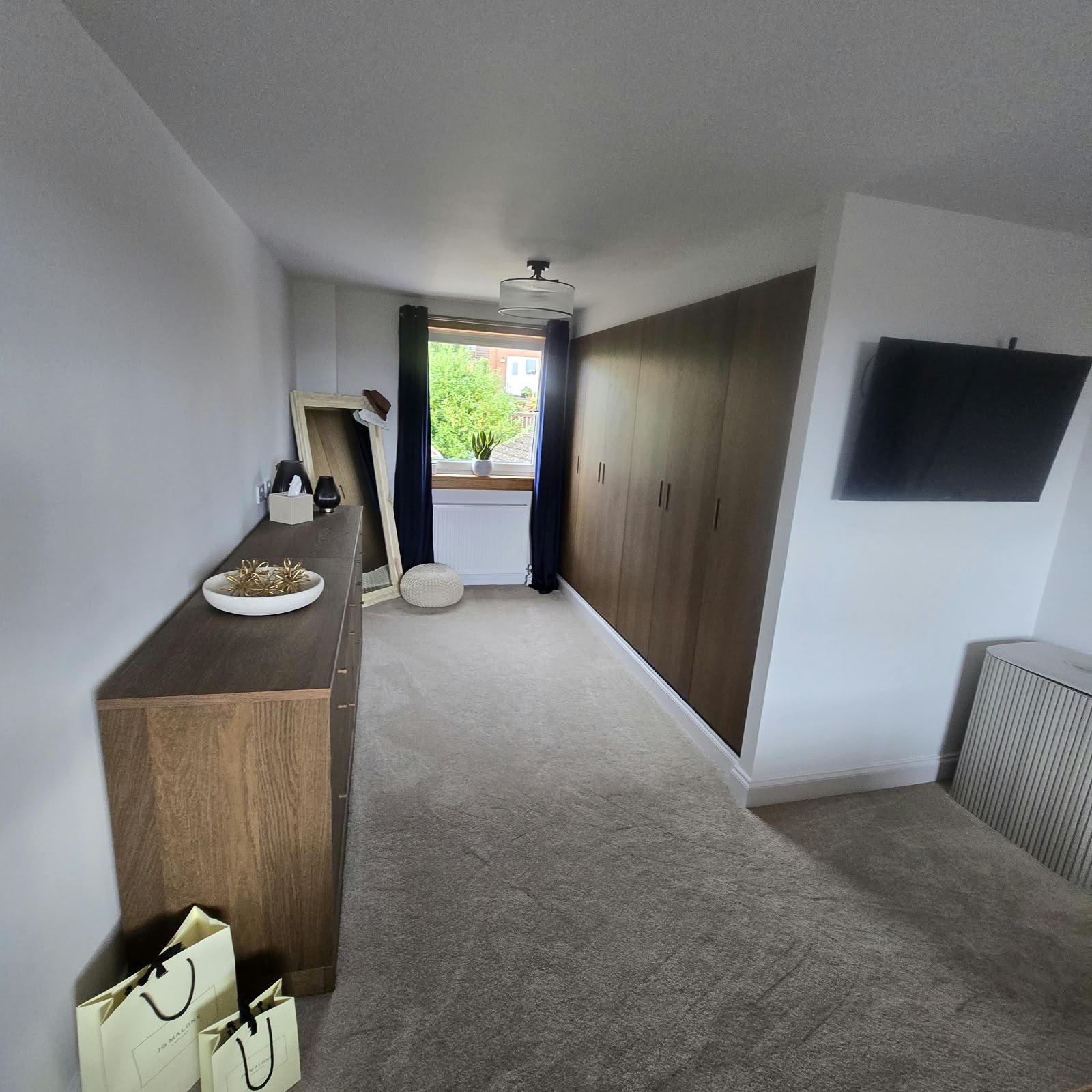 Fitted wardrobes in an upstairs room