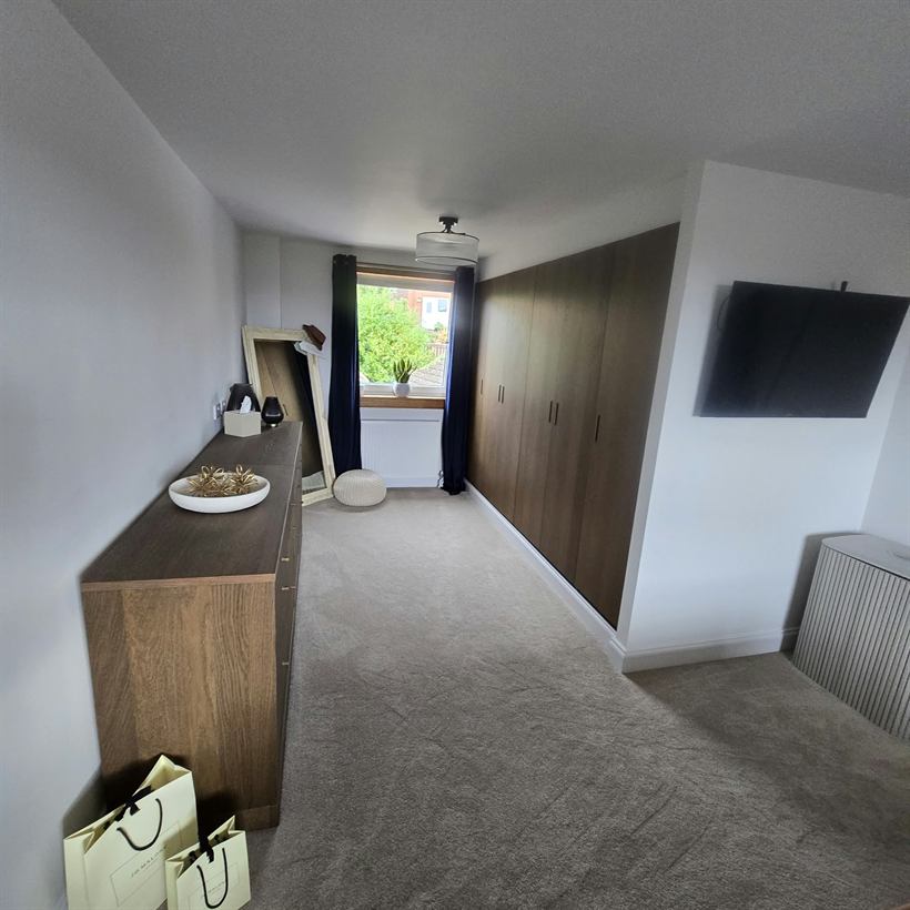 Fitted wardrobes in an upstairs room